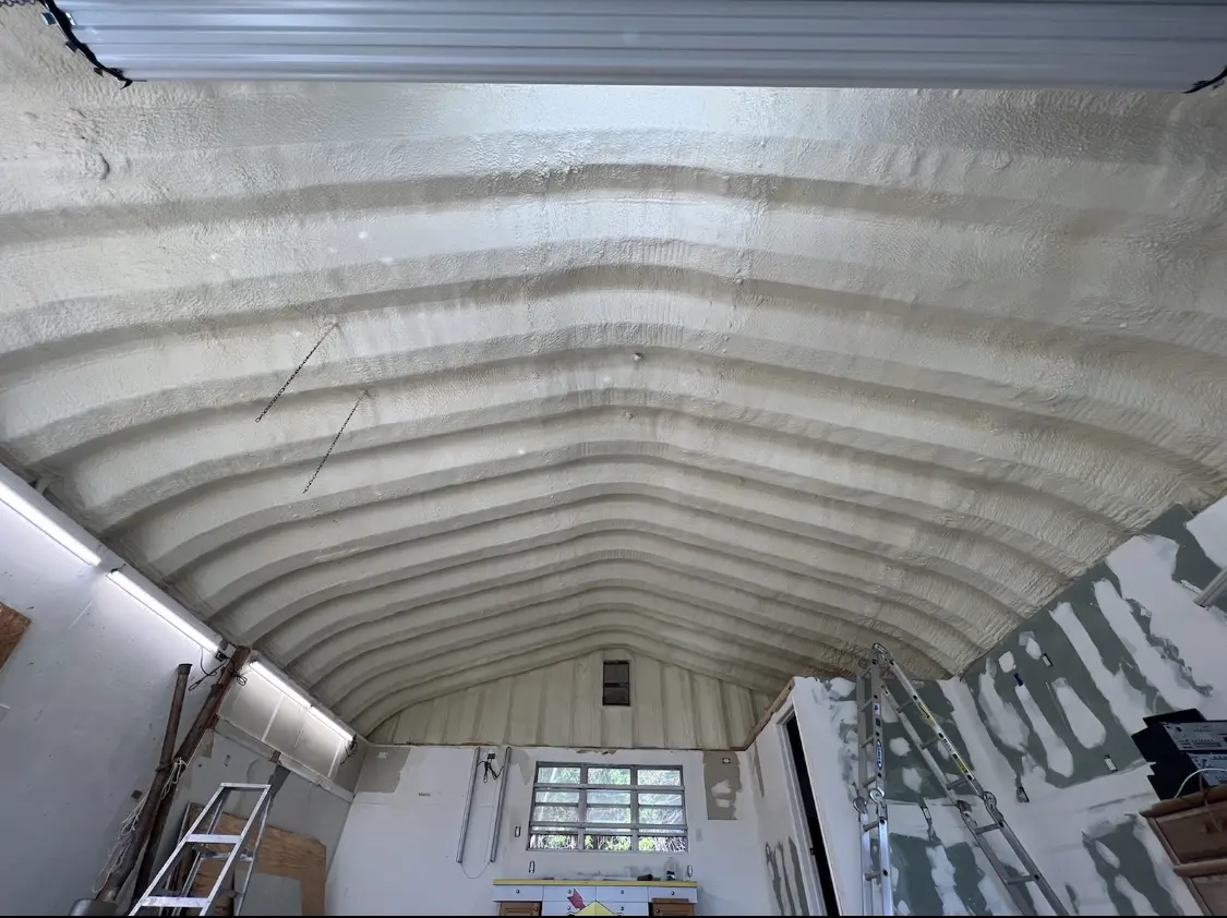 Spray polyurethane foam applied to the underside of a metal roof deck in Culpeper